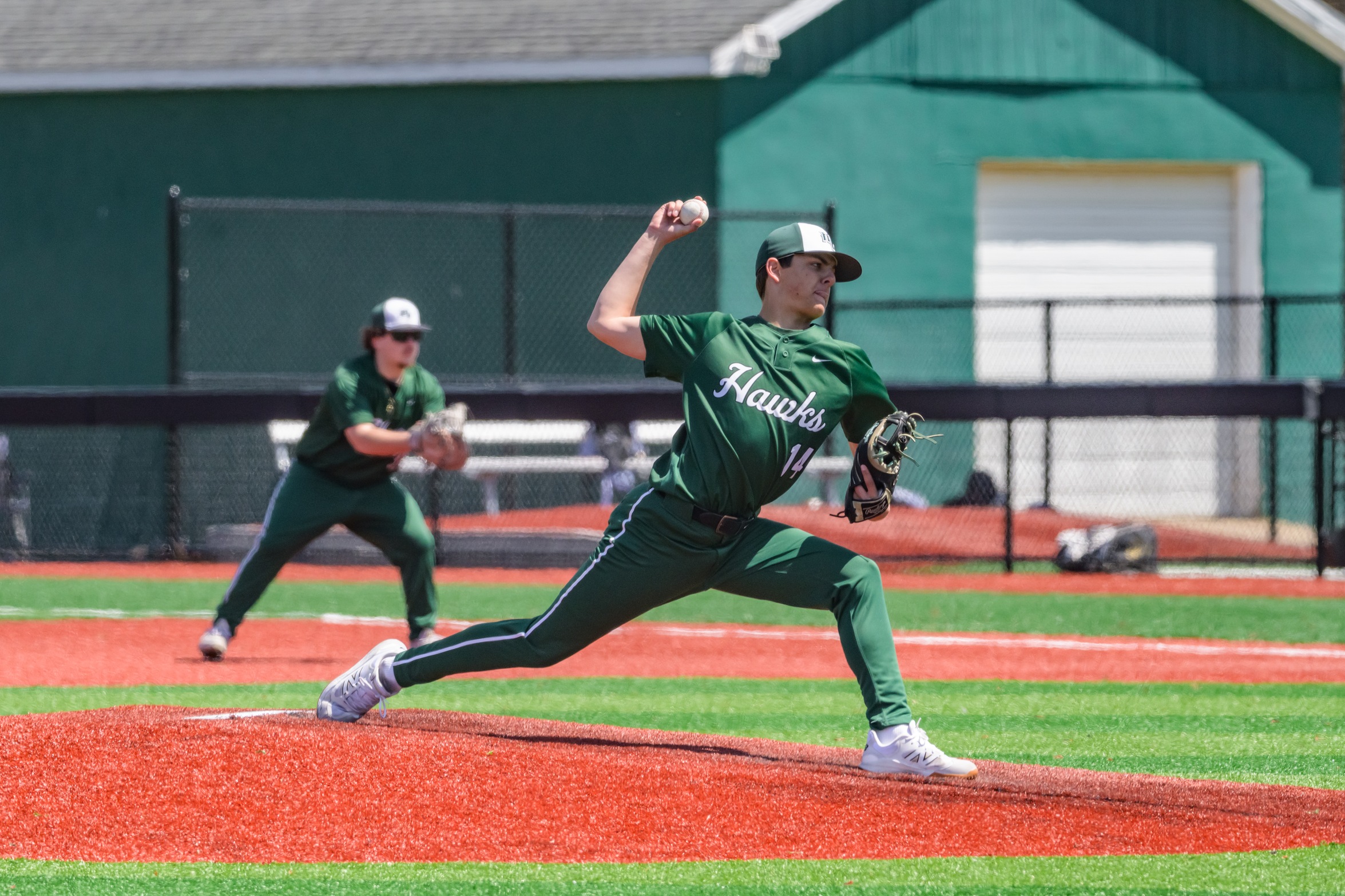 Hawks pitcher throws a pitch.